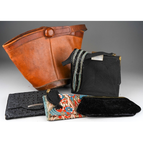 891 - A small collection of vintage bags, including a Norris brown leather pail shaped bag, a black croche... 