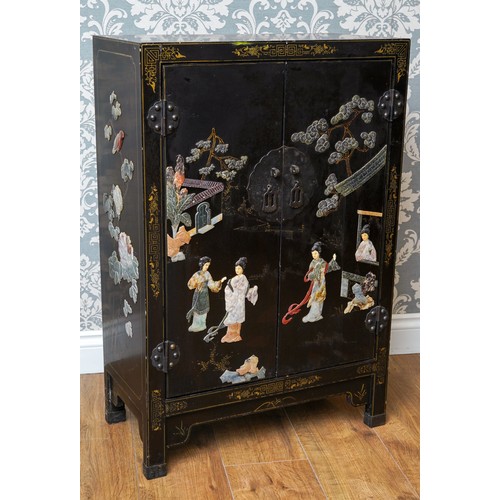 946 - A mid to late 20th century Japanese black lacquered, gilt and Shibayama style double door cabinet, t... 