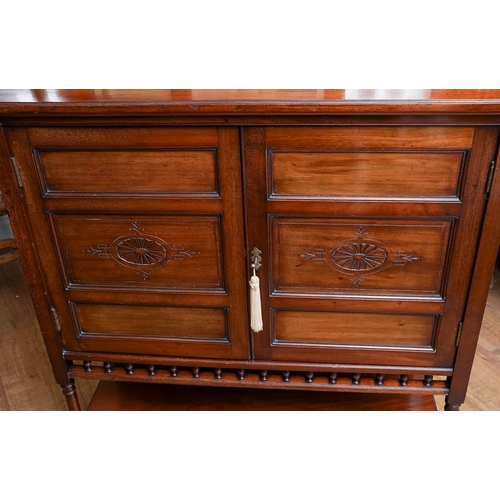 951 - An Arts & Crafts mahogany chiffonier, top section with three bevel glazed panels above cupboard door... 