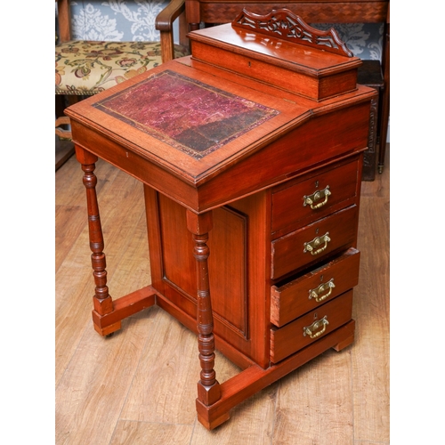 955 - An early 20th Century mahogany Davenport desk, fitted top section above leather slope front, each si... 