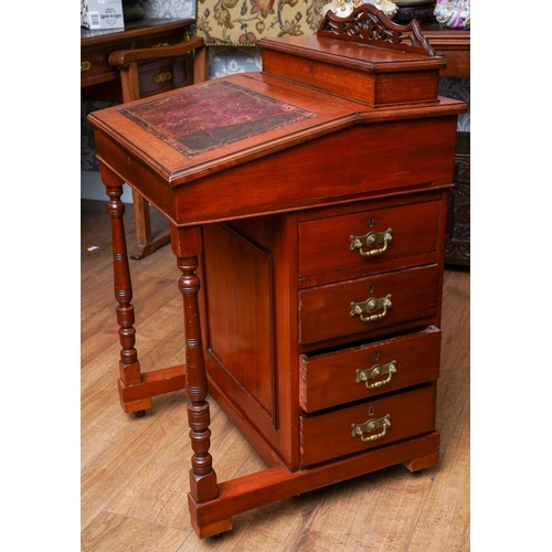 955 - An early 20th Century mahogany Davenport desk, fitted top section above leather slope front, each si... 