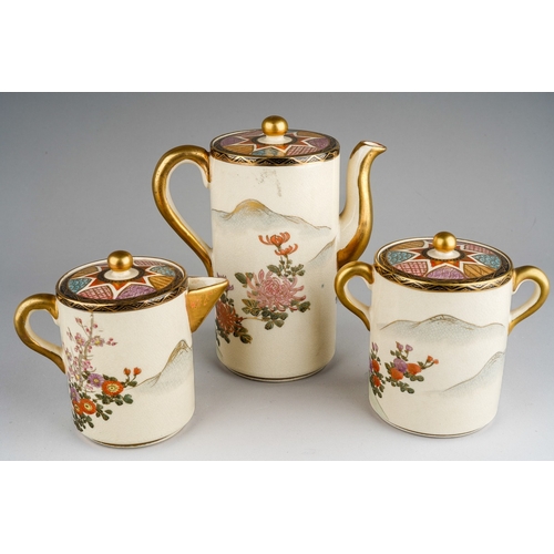 1002 - An early 20th century Japanese Satsuma pottery three piece coffee set of cylindrical form, the lids ... 