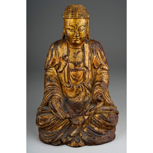 1005 - Antique Chinese gilt wood carved Buddha figure. 20cm tall