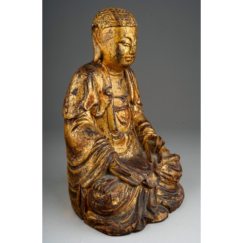 1005 - Antique Chinese gilt wood carved Buddha figure. 20cm tall