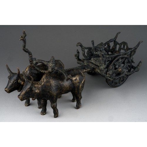 1017 - A Kymer style bronze model of Oxen and Cart with figure