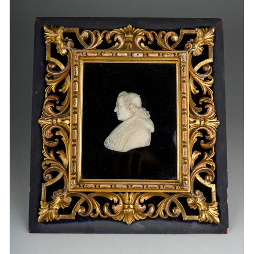 1022 - Century carved ivory plaque depicting Pope Pius VIII, mounted on black velvet within a carved gilt w... 