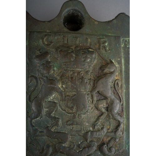 1023 - 18th century Georgian bronze 7lb wool weight, mounted on a wooden block as it has been used as a pap... 