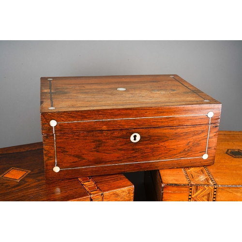 1026 - Four Victorian work boxes of rectangular form, all lacking internal fittings, one in rosewood with m... 