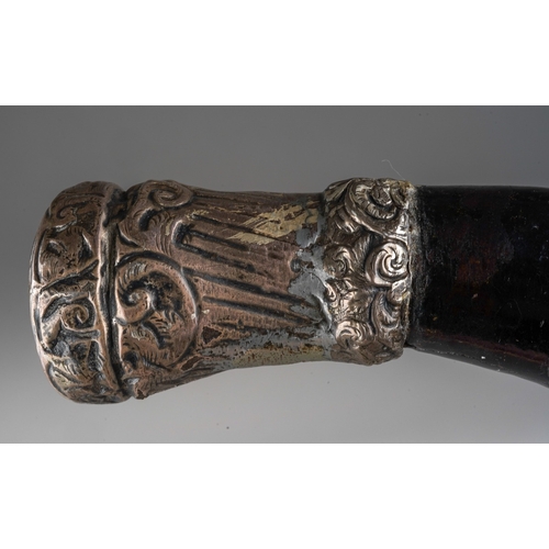 1028 - A late 19th century ebony and bone inlaid walking stick, the handle with white metal mount (soldered... 