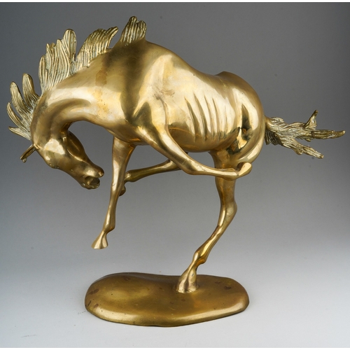 77 - A second half 20th century brass figure of a frolicking Stallion, on an oval base, height 45cm x len... 