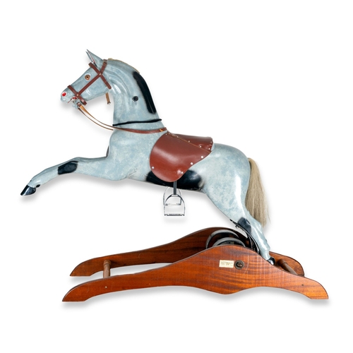 82 - A Ragamuffin Toys Ltd rearing rocking horse, painted fibre glass body, coiled sprung action to back ... 