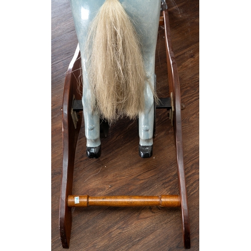 82 - A Ragamuffin Toys Ltd rearing rocking horse, painted fibre glass body, coiled sprung action to back ... 