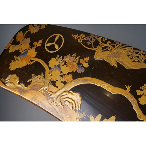 87 - An Edo period (1615-1868), early/mid 19th century black lacquered Kyosoku (armrest)
decorated in gol... 