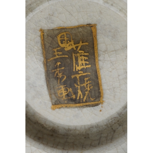 100 - A Japanese Satsuma pottery Meiji period (1868 to 1912) tea pot of waisted hexagonal form on three sh... 