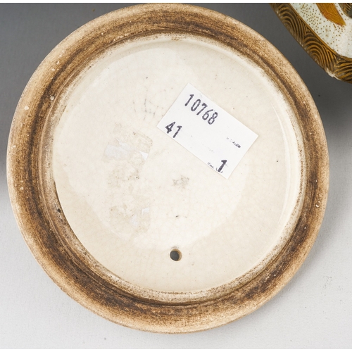 100 - A Japanese Satsuma pottery Meiji period (1868 to 1912) tea pot of waisted hexagonal form on three sh... 