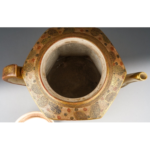 100 - A Japanese Satsuma pottery Meiji period (1868 to 1912) tea pot of waisted hexagonal form on three sh... 