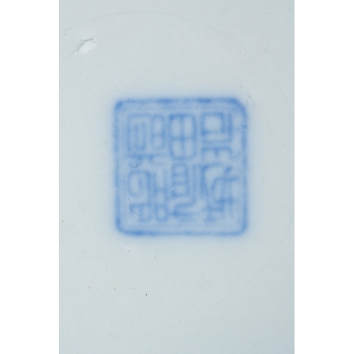 117 - A 19th century Japanese wavy rimmed plate, underglaze blue prunus blossom decoration on an over pain... 