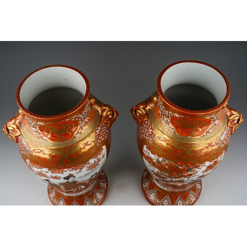 119 - A pair of late 19th century Japanese Kutani porcelain baluster vases, dragon mask twin handles and d... 