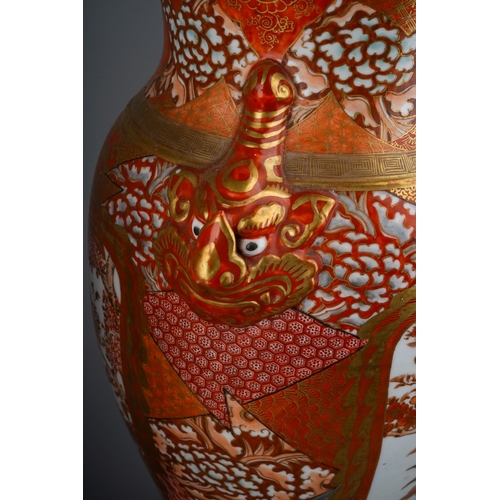 119 - A pair of late 19th century Japanese Kutani porcelain baluster vases, dragon mask twin handles and d... 