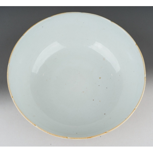 120 - A Chinese porcelain bowl, lobed rim, plain interior, the exterior polychrome enamelled with carp swi... 