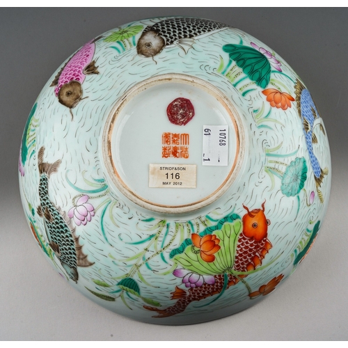 120 - A Chinese porcelain bowl, lobed rim, plain interior, the exterior polychrome enamelled with carp swi... 