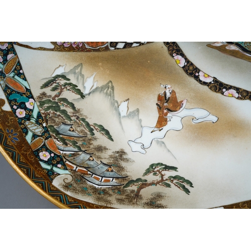 122 - A Japanese Kutani porcelain charger, Meiji period (1868-1912), geometric border surrounding three pa... 