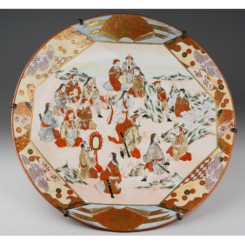123 - A Japanese Kutani charger, Meiji period (1868-1912), the interior painted with an octagonal central ... 