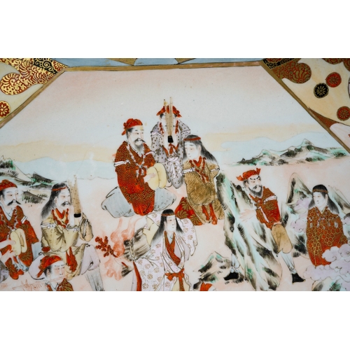 123 - A Japanese Kutani charger, Meiji period (1868-1912), the interior painted with an octagonal central ... 