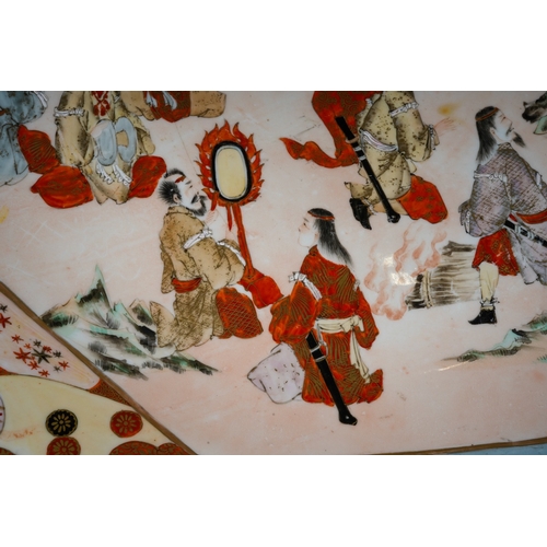 123 - A Japanese Kutani charger, Meiji period (1868-1912), the interior painted with an octagonal central ... 