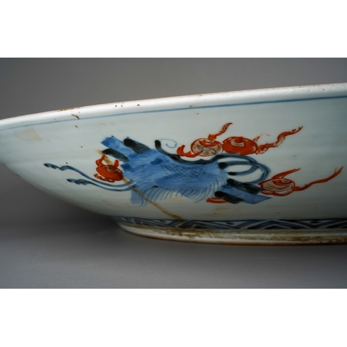 125 - A large Japanese porcelain charger, Meiji period (1868-1912), the turquoise ground border polychrome... 