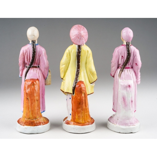 127 - Three 19th Century hard paste Russian porcelain figures of Oriental males, two the same model with v... 