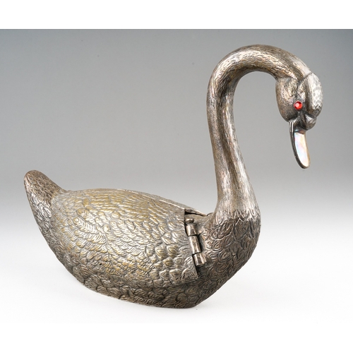 129 - A 20th century silver plated flower holder in the form of a swan, red paste eyes, the hinged wings o... 