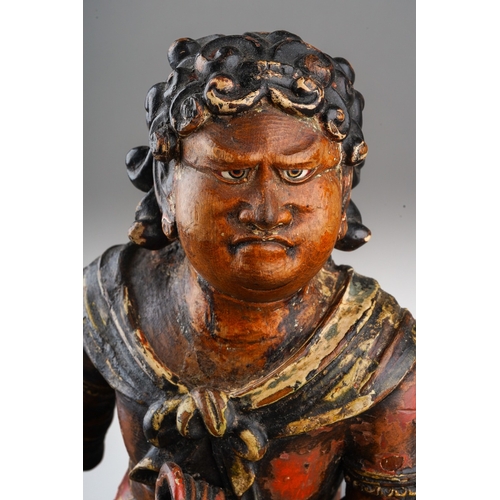 134 - A 17th Japanese Edo period (1603 - 1868) polychrome carved wood figure of Seitaka Doji, painted in p... 