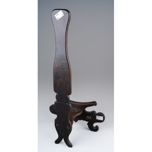 140 - A Chinese carved hardwood stand for a charger, overall height 47cm x max width 23cm