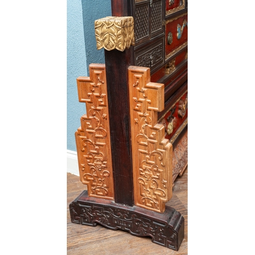 142 - A pair of 20th century Chinese floorstanding screens on separate stands, each decorated in the form ... 