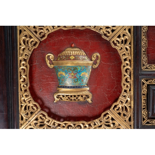 142 - A pair of 20th century Chinese floorstanding screens on separate stands, each decorated in the form ... 