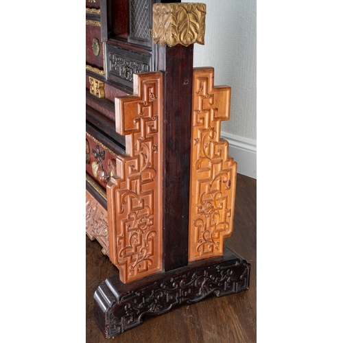 142 - A pair of 20th century Chinese floorstanding screens on separate stands, each decorated in the form ... 