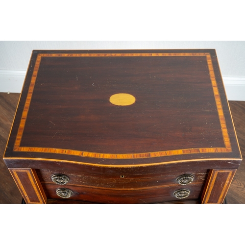 144 - An Edwardian  mahogany and satinwood banded serpentine fronted table canteen of silver plated Fiddle... 