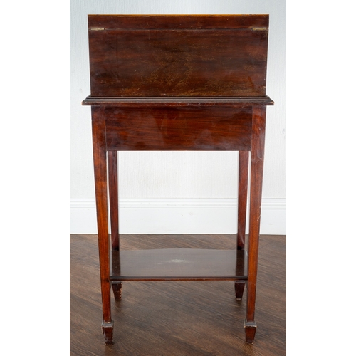 144 - An Edwardian  mahogany and satinwood banded serpentine fronted table canteen of silver plated Fiddle... 