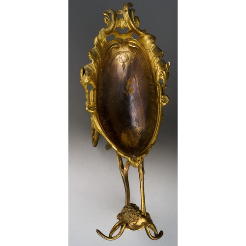 145 - An ormolu table centrepiece in the form of a shell shaped carriage being pulled by a young nymph, on... 