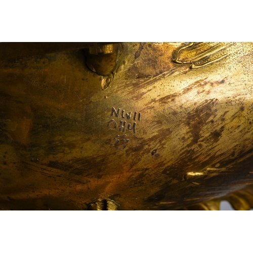 145 - An ormolu table centrepiece in the form of a shell shaped carriage being pulled by a young nymph, on... 