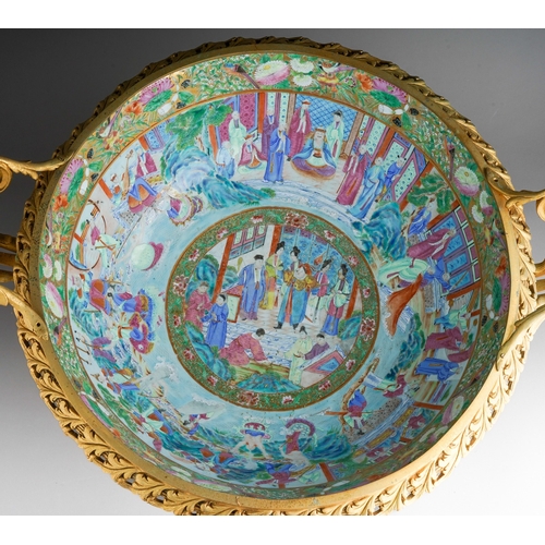 147 - A 19th century Chinese Canton porcelain famille rose and ormolu mounted punch bowl, the porcelain en... 