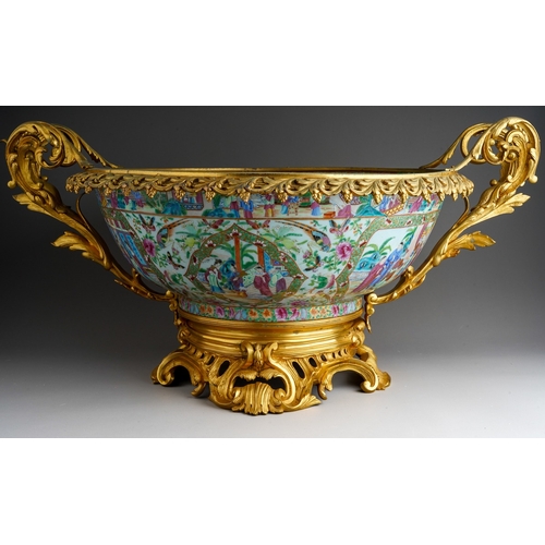 147 - A 19th century Chinese Canton porcelain famille rose and ormolu mounted punch bowl, the porcelain en... 