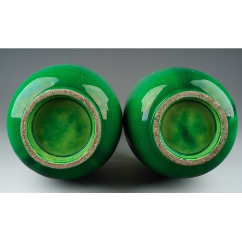 149 - A pair of Japanese Meiji period Awaji dragon vases of baluster form, green glazed and decorated in h... 