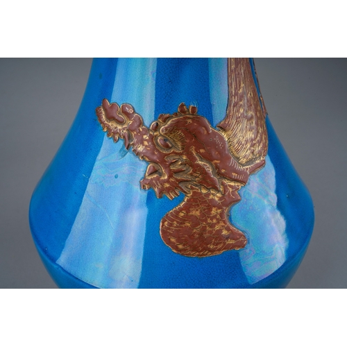 150 - A Japanese Meiji period (1868-1912) monochrome baluster vase, the dark turquoise blue ground decorat... 