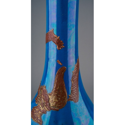 150 - A Japanese Meiji period (1868-1912) monochrome baluster vase, the dark turquoise blue ground decorat... 