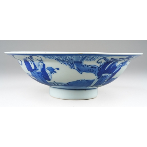 159 - A 19th century Chinese blue and white shallow bowl, interior with roundel depicting a coastal scene,... 