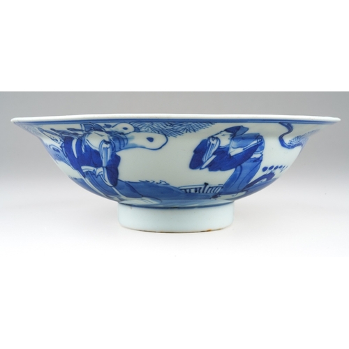 159 - A 19th century Chinese blue and white shallow bowl, interior with roundel depicting a coastal scene,... 