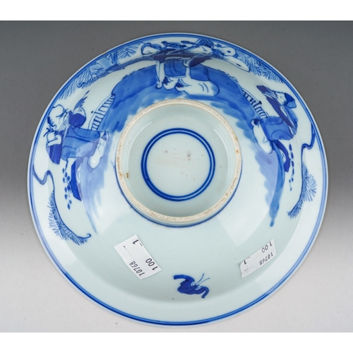 159 - A 19th century Chinese blue and white shallow bowl, interior with roundel depicting a coastal scene,... 