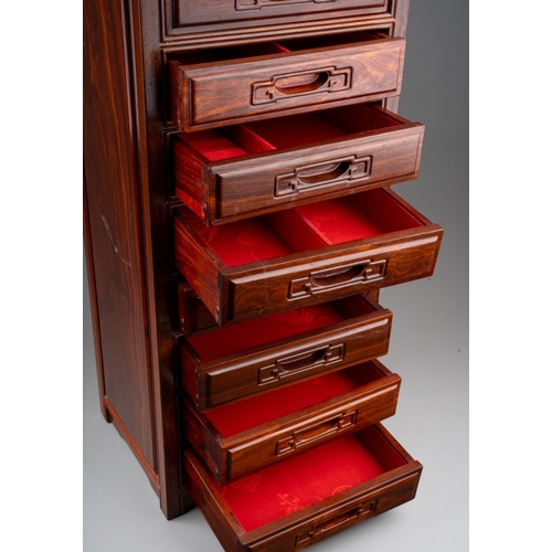 160 - A late 20th / early 21st century Chinese hardwood jewellery chest of eight drawers of narrow proport... 